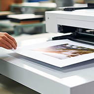 Business concept. Top view photo of workplace stack of pink diar