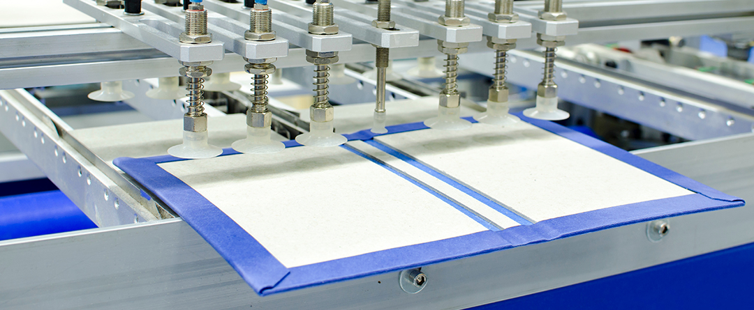 Many coiled school books together; repeating pattern of coils ho